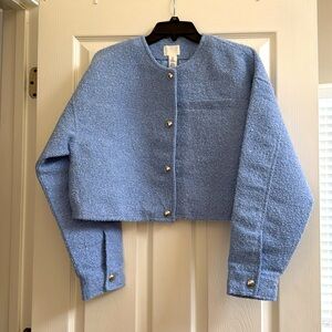 Light blue cropped jacket, silver buttons